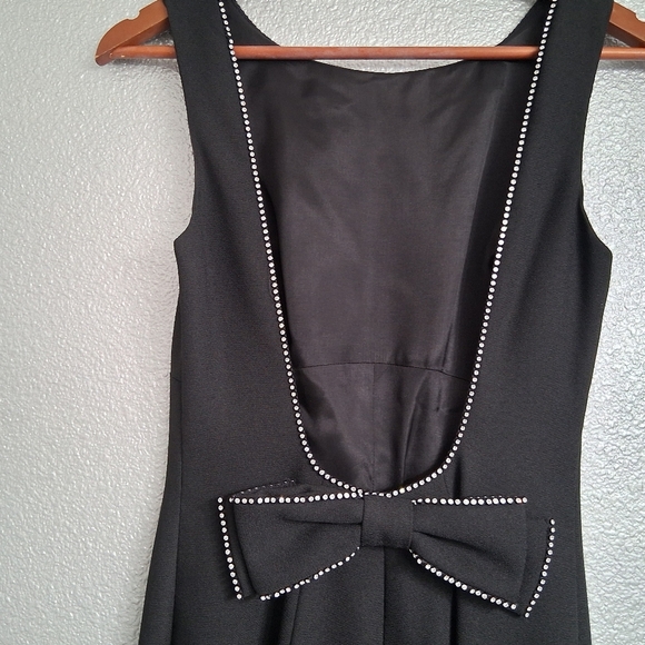 Cach`e Black Jumpsuit With A Scoop Back Outlined With Rhinestones   Size 6 - Picture 11 of 16